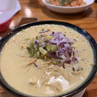 Khao soi and phad Thai in the background