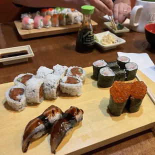 Spicy tuna roll, yellowtail roll, eel sushi, ikura sushi