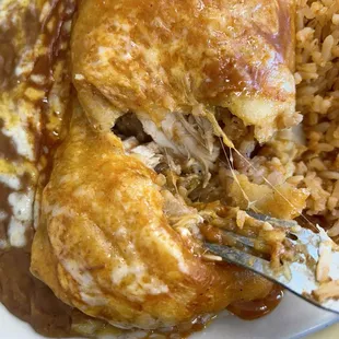 Shredded chicken chimichanga enchilada style