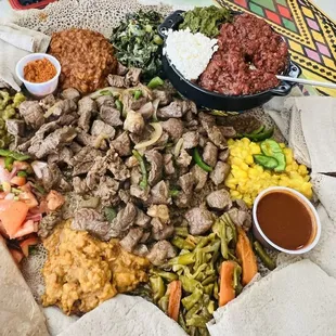Shint Tibs (center) Special Kitfo and Veggie Combo
