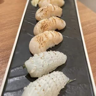 Top:  scallop nigiri x4 ika nigiri x2