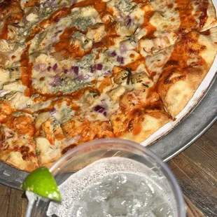 Buffalo chicken pizza and tequila sour cream