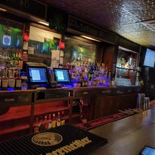 a bar with a lot of liquor
