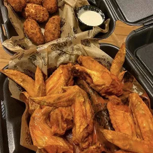Wings and poppers takeout
