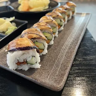 a sushi roll on a plate