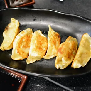 a plate of dumplings