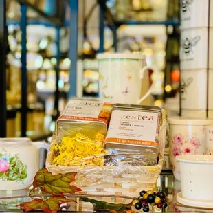 a variety of tea and coffee mugs