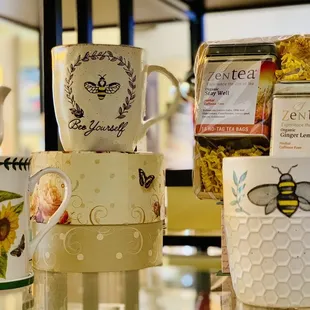 a variety of coffee mugs on display