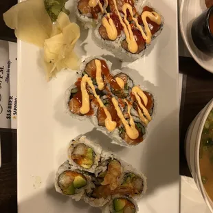 a plate of sushi and a bowl of soup