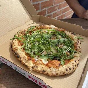 The Specialty...pear, goat cheese, arugula, garlic...soooo good!