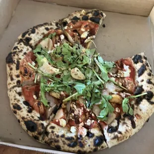 Speciality pizza has plenty of garlic to get your breath kicking