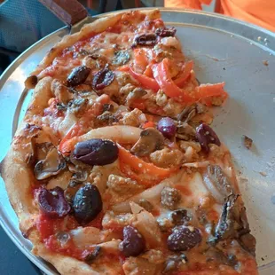 Kalamate Olive on supreme pizza