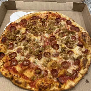 Pepperoni and sausage thin crust pie