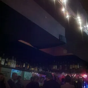 people sitting at the bar