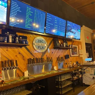 a bar with beer taps