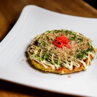 Must try! Get their okonomiyaki with bacon - thank me later =P