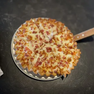 Chicken bacon ranch pizza with their signature white sauce is incredible!