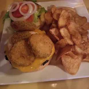 Burger with fried pickles and homemade goodness chips!