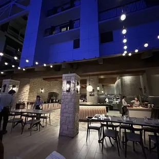 the interior of a restaurant at night