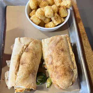 Chicken banh mi with Cajun tots