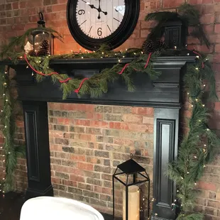 a fireplace with a clock on it