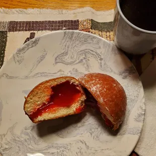 Strawberry Paczki from Zerilli's bakery, Monday night dessert with Decaf.   2/12/2024