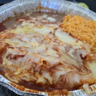 The whole enchilada plate. Freaking cheesy gooey delicious awesomeness.