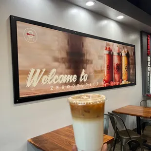 a person holding a cup of coffee