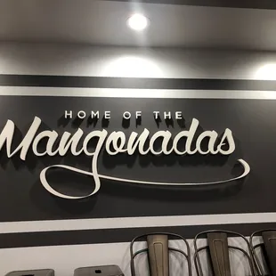a sign that says home of the mangoadas