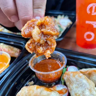 Zero Degrees&apos; Fried Dumplings include five cooked pork and veggie dumplings, served alongside signature house spicy sauce.