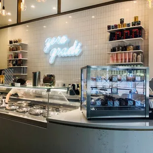 a counter with a variety of food items