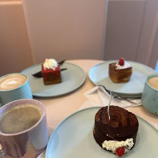 a plate of cake and a cup of coffee