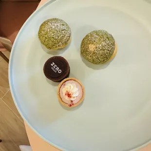 three pastries on a plate