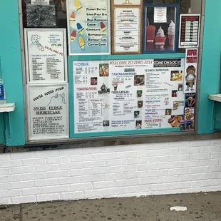 a sign in front of a restaurant