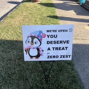 a sign that reads, you deserve a treat at zero zest