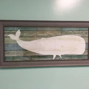 a picture of a wooden whale