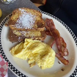 Seeet Moody with scrambled eggs and bacon.