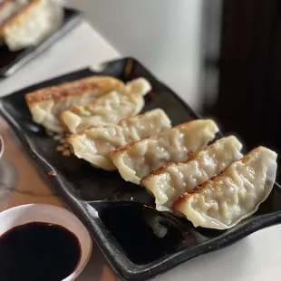 a plate of dumplings on a table