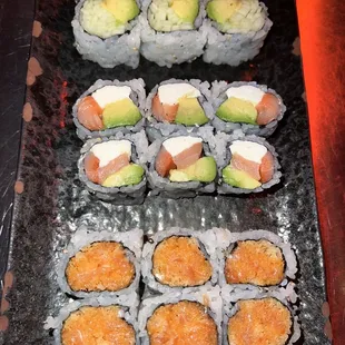 Spicy Salmon Roll and Cucumber Avocado Roll and Philadelphia Roll