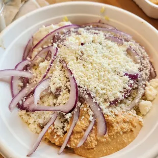 Chicken Bowl w/ red onion, feta, garlic sauce, zesty feta sauce, chicken &amp; rice pilaf