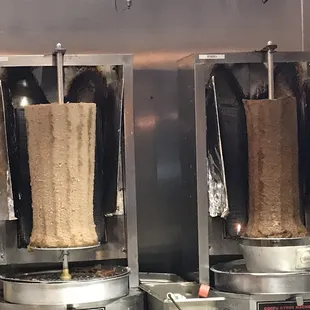 two kebabs being cooked