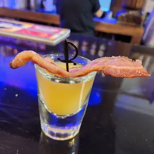 Breakfast shot with strip of bacon