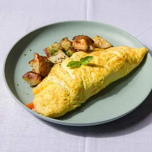  an omelet and potatoes