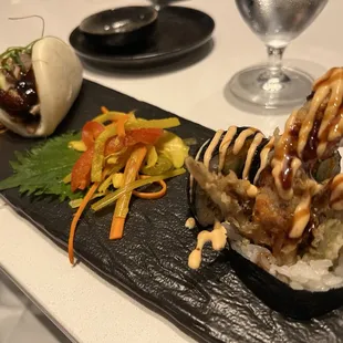 Trio of bao with Peking duck, pickled veggies, spider roll