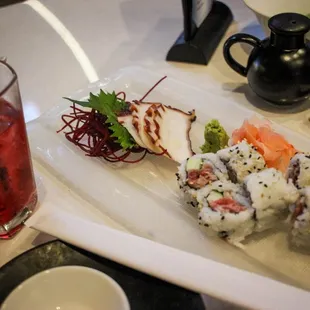 Sushi rolls prepared gluten free and happy hour house cocktail