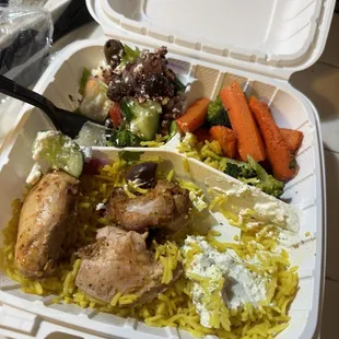 Chicken thighs instead of breast for Mediterranean food.  Salad no dressing.  Rice colored af with bland taste.  Veggies didn't ask for.