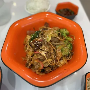 Lamb and veggies cooked in Sichuan peppercorn chili oil.