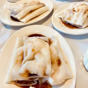 three plates of food on a table