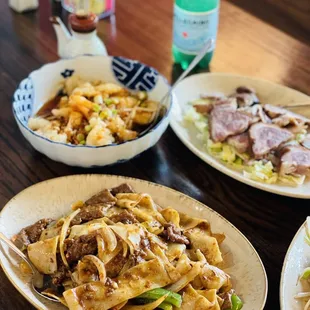 three plates of food on a table