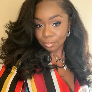 Joy B.